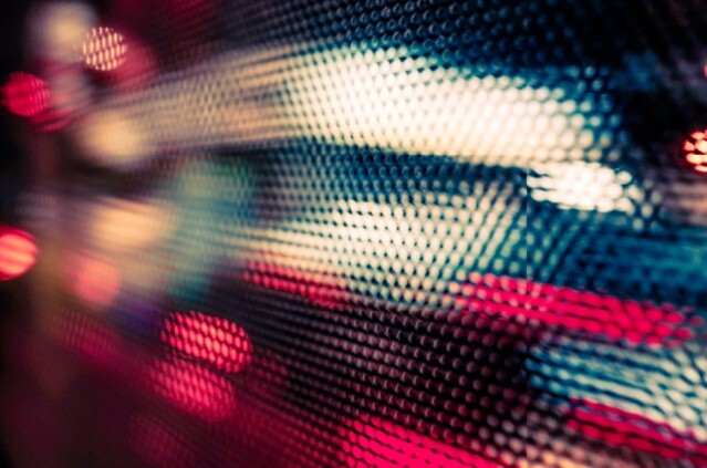 Abstract colour background with bokeh defocused lights and shadow